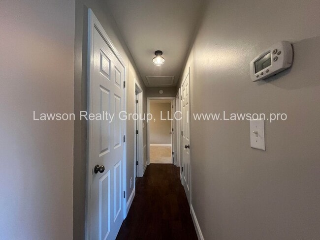 Building Photo - Charming Brick Ranch with Beautifully Land...