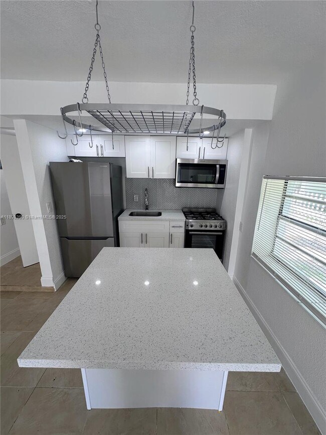 Building Photo - 9064 Collins Ave