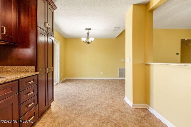 Building Photo - 8066 Le Havre Dr N