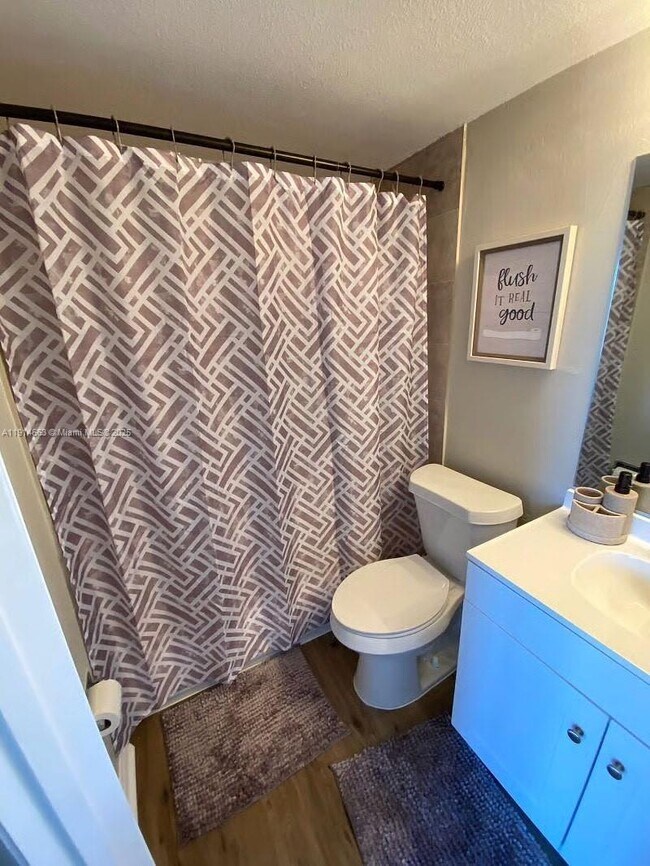 Building Photo - 6060 Village Cir N