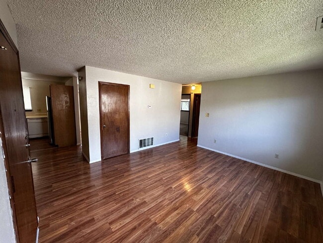 Building Photo - Available Immediately! Charming 2-Bed Cond...