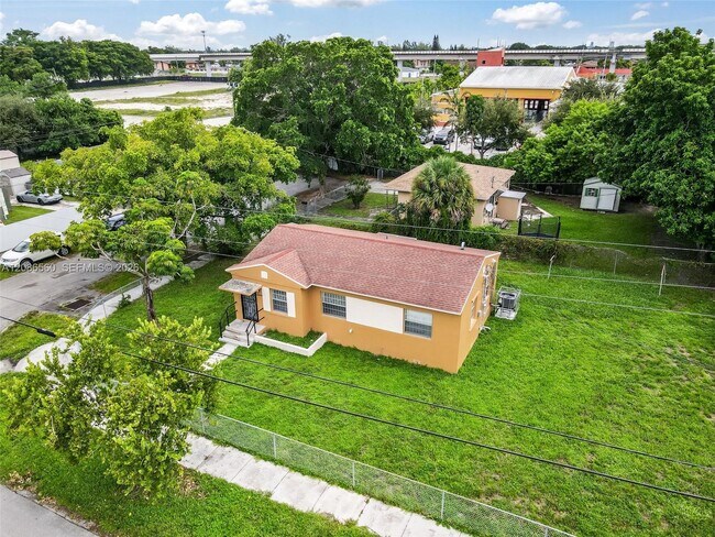 Building Photo - 6499 NW 29th Ave