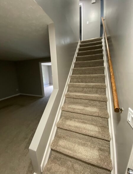 Stairs leading to upper level - 3123 Thornton St NW