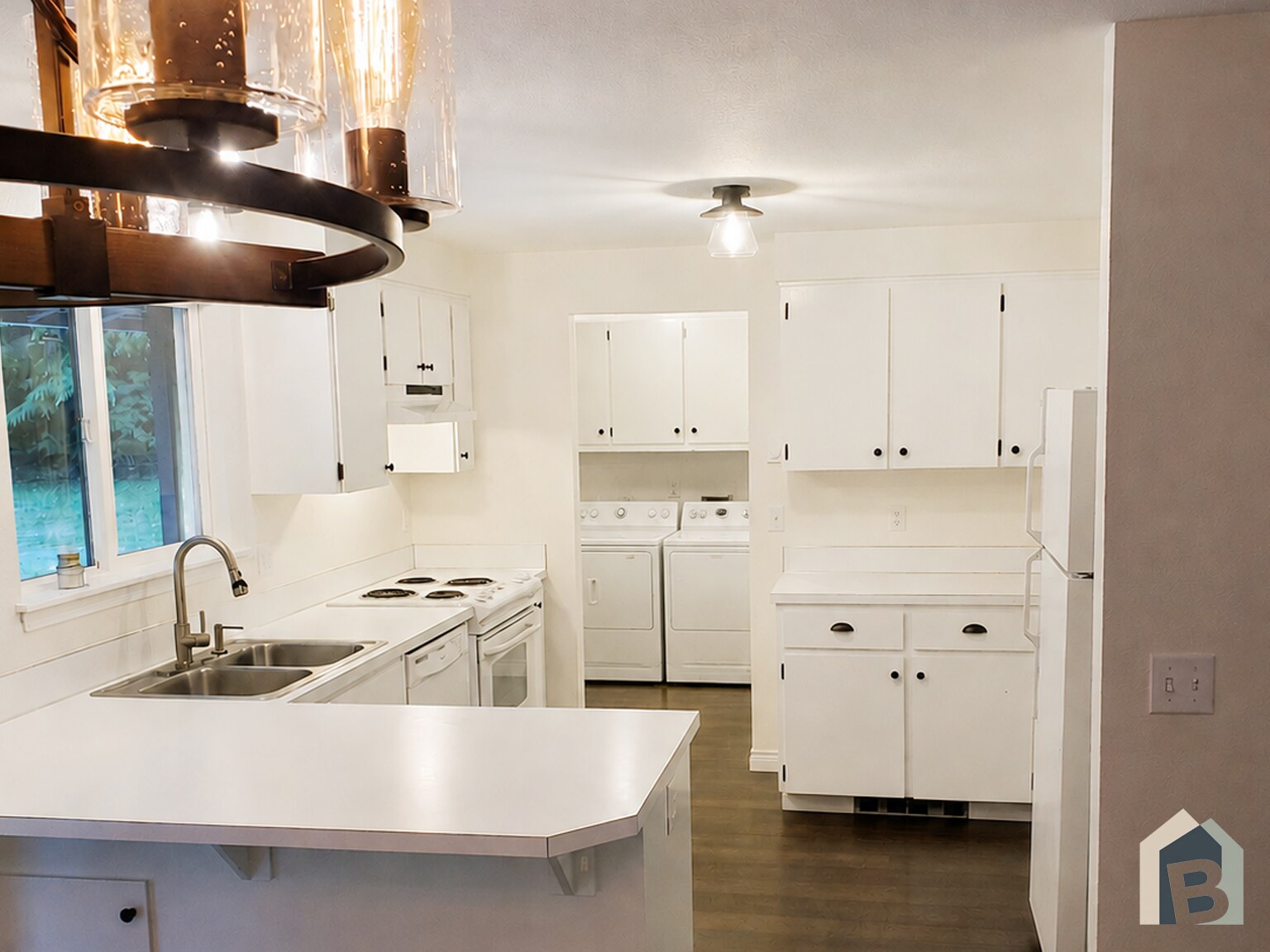 Kitchen with plenty of storage. New countertops being installed soon :) - 20981 Port Gamble Rd NE