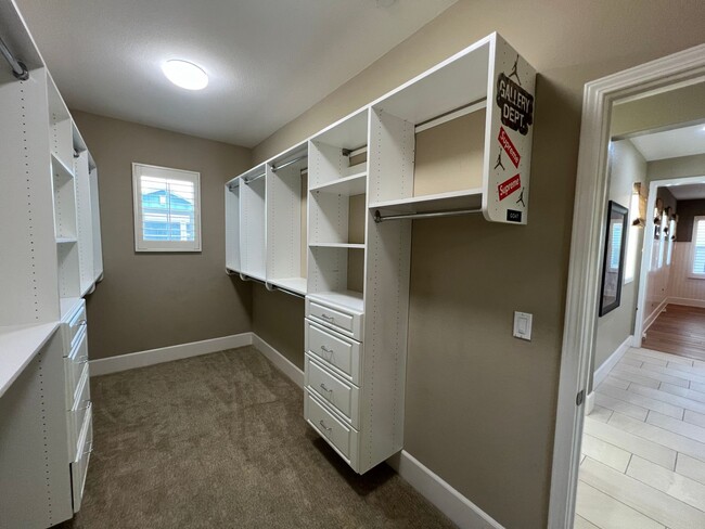 Building Photo - Former model home with tons of upgrades in...