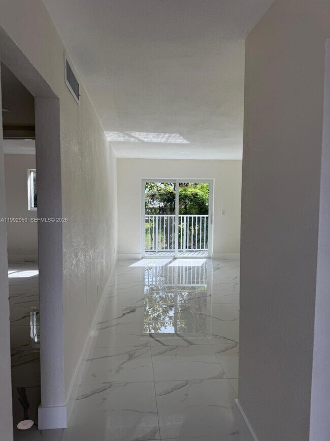 Building Photo - 4298 NW S Tamiami Canal Dr