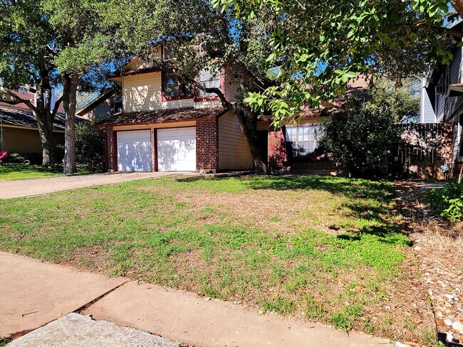 Building Photo - Warm & Inviting 4BR / 2.5BA Home with Covered Deck and 2-Car Garage