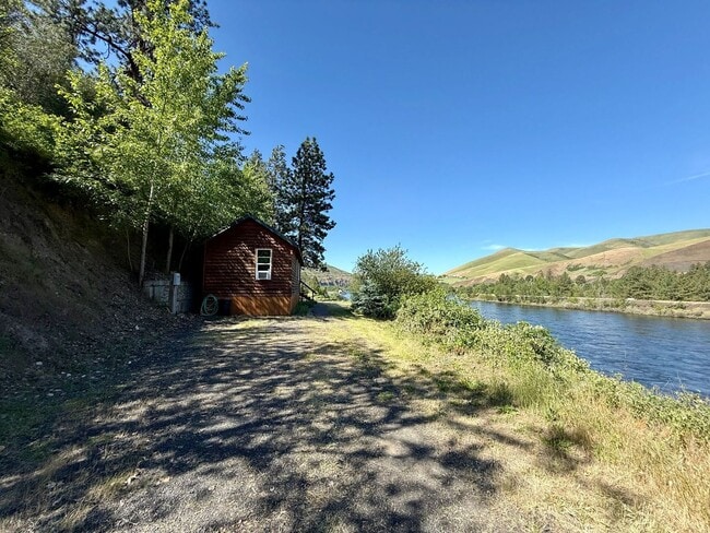 Building Photo - Fully Furnished Riverfront Cabin on the Clearwater River – Move-In Ready!