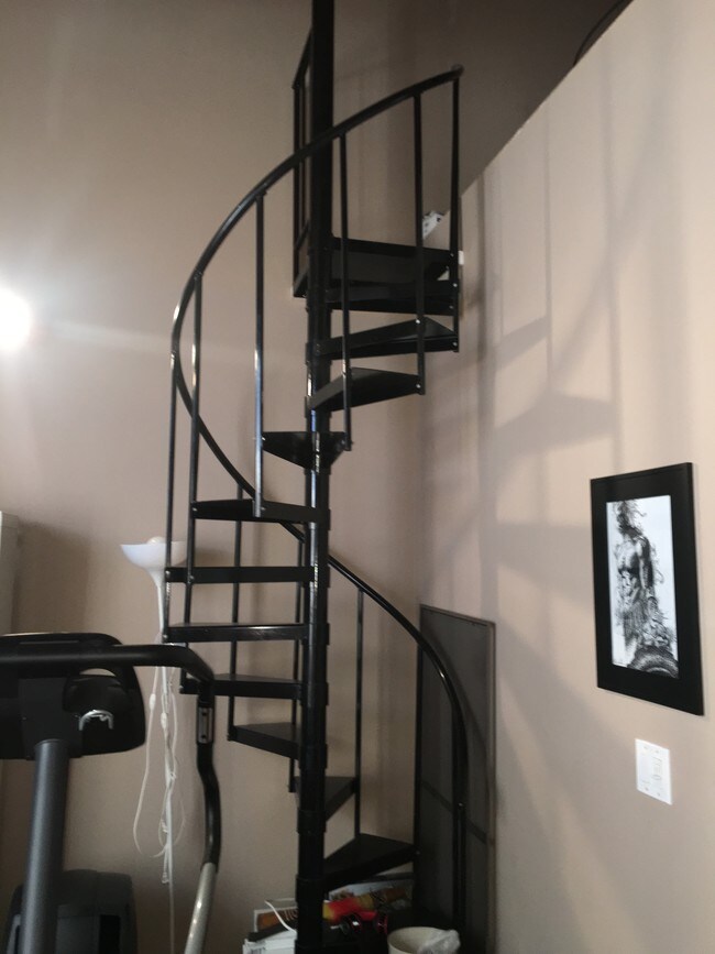 Stairs leading to rooftop - 2334 W Polk St