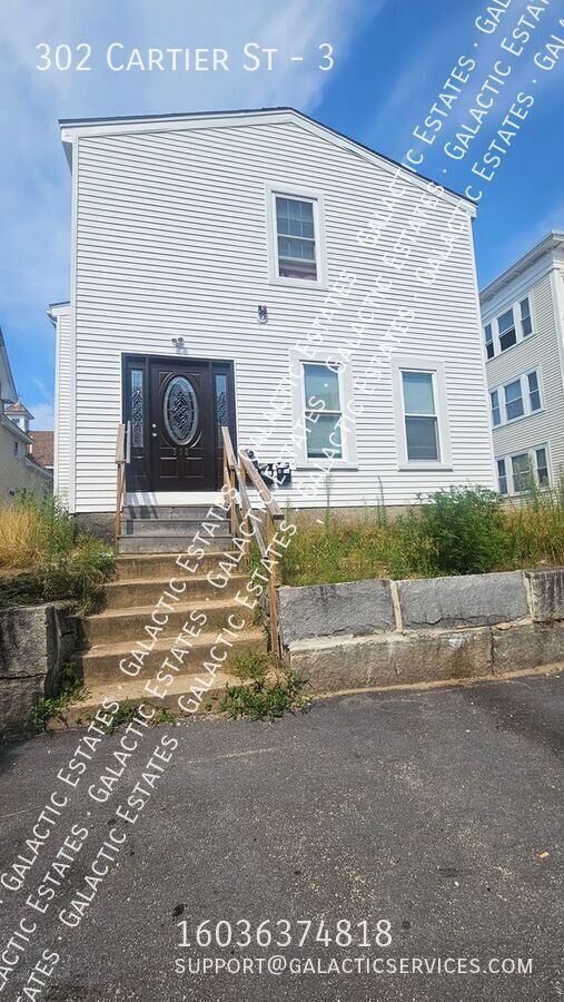 Building Photo - 302 Cartier St