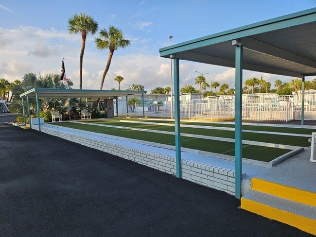 Building Photo - Beautiful fully furnished one bedroom, one bath manufactured home in a 55+ deed restricted gated ...