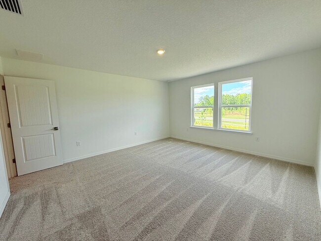 Building Photo - Sprawling 5BR/4.5BA Dream Home with 3-Car ...