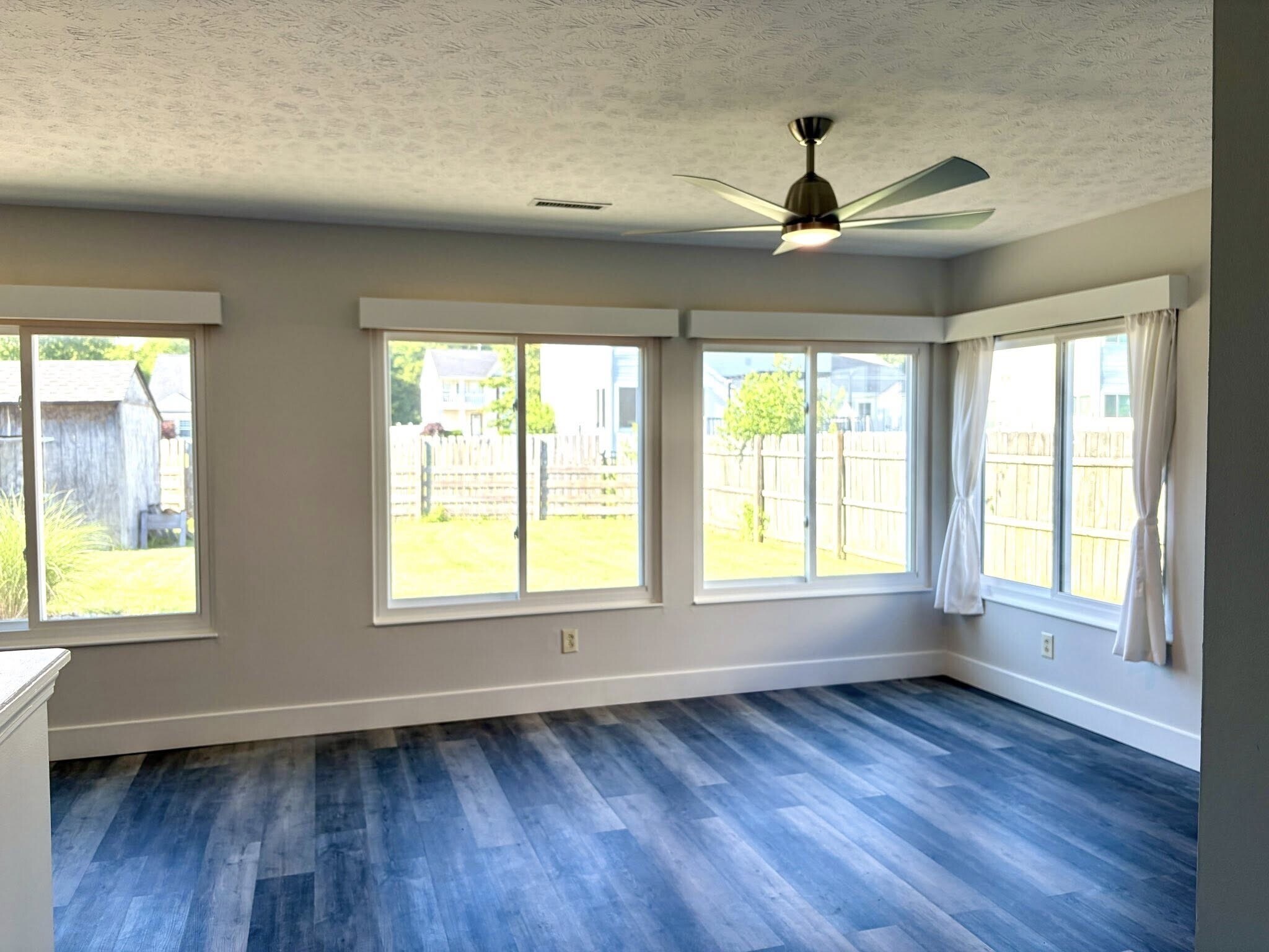 Large, light filled living area with huge windows - 1200 Bugle Bluff Ct