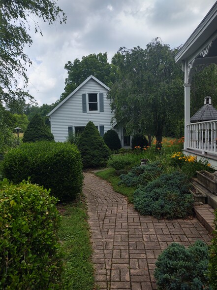 Pleasant landscaping. - 7923 Old 3C Hwy