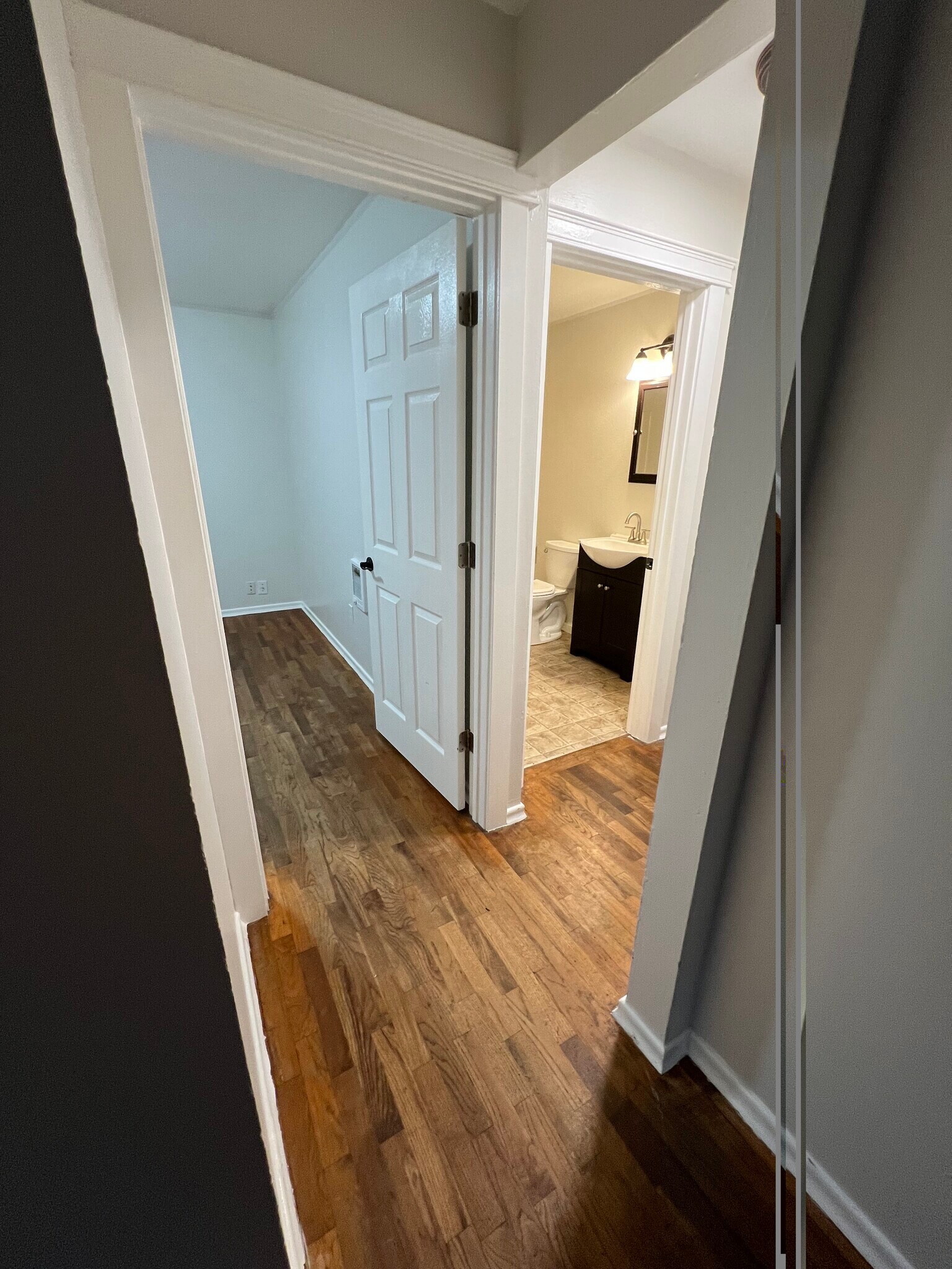 Hallway to bedroom, bathroom and hall closet. - 620 6th Ave