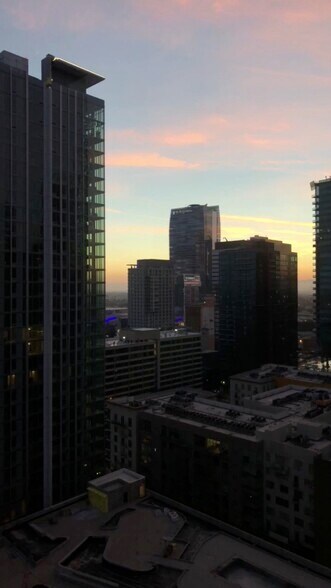 View of the sunset from the living room area - 801 S Grand Ave