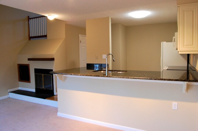 Open living room w/ fireplace - 2667 Chancer Dr