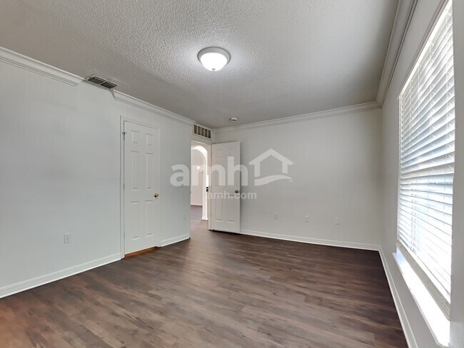 Building Photo - 6686 Gentle Oaks Dr E