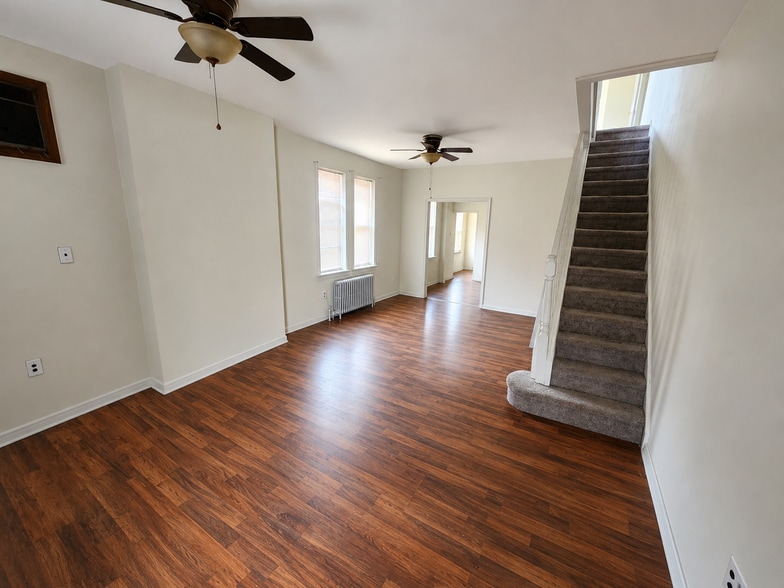 living room post renovation, tons of room - 2516 E Oakdale St