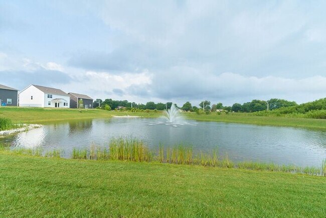Building Photo - 4 Bedroom at Trotter's Landing in Camby With Pond View!