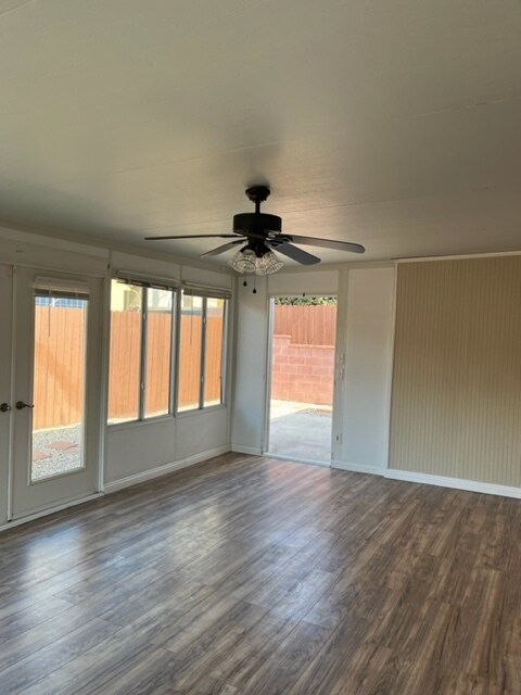 Sunroom leads to backyard. - 18033 Glenburn Ave
