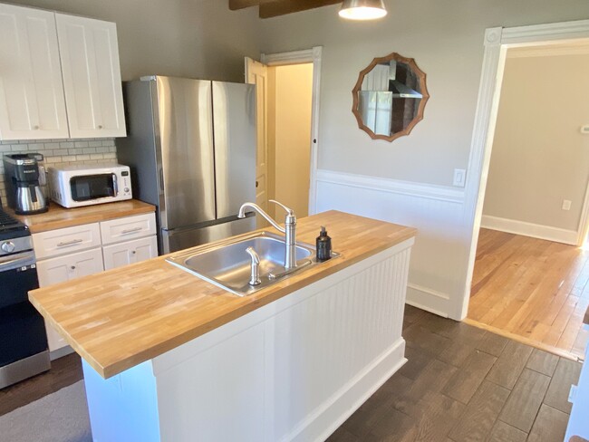 Kitchen and basement door (left corner) - 16 W College Ave