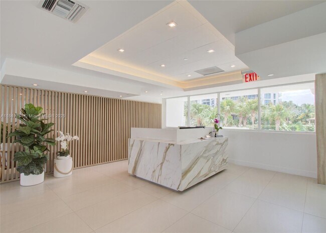 Building Photo - 5900 Collins Ave