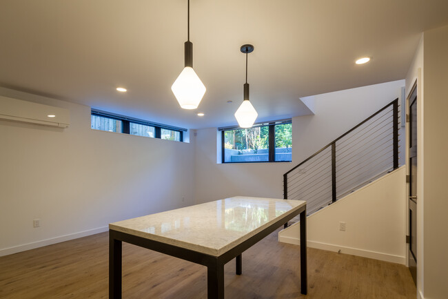 Bright and light garden level unit with hard surface flooring throughout - 625 Malden Ave E