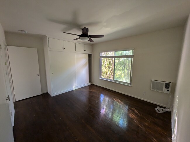 First bedroom - extra closet space and storage - 6556 San Vicente Blvd