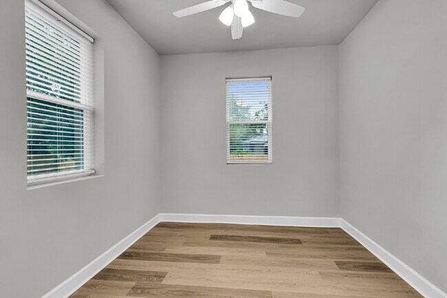 Building Photo - Cute all brick ranch on a large corner lot with fenced in yard and 1 car garage