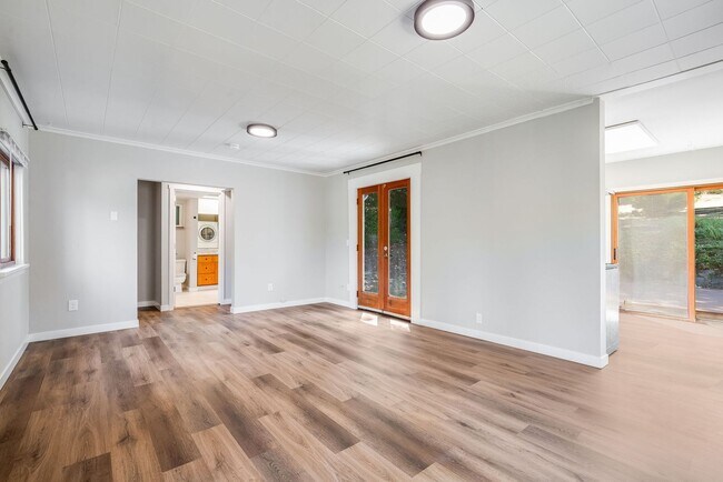 Building Photo - Charming 1 BD 1 BA cottage nestled on a be...