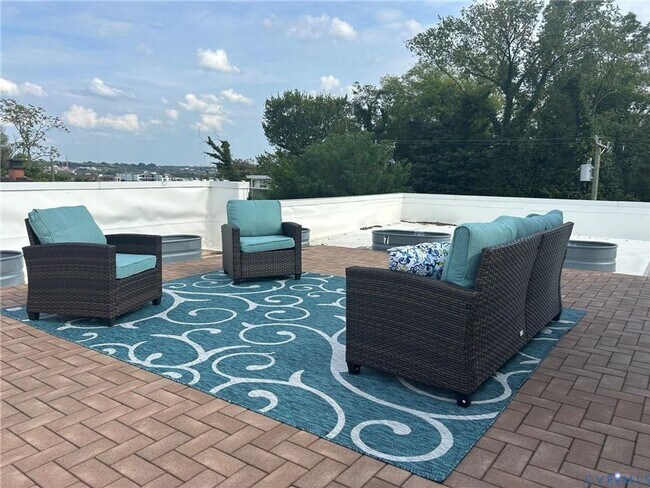Building Photo - Now Available – Partially Furnished Luxury Condo with Rooftop Terrace | Ideal for Incoming VCU St...