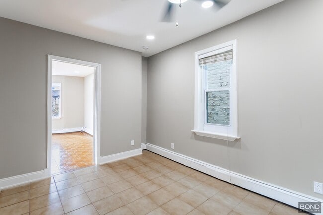 Building Photo - Charming Large Studio Apartment in the Heart of Maspeth