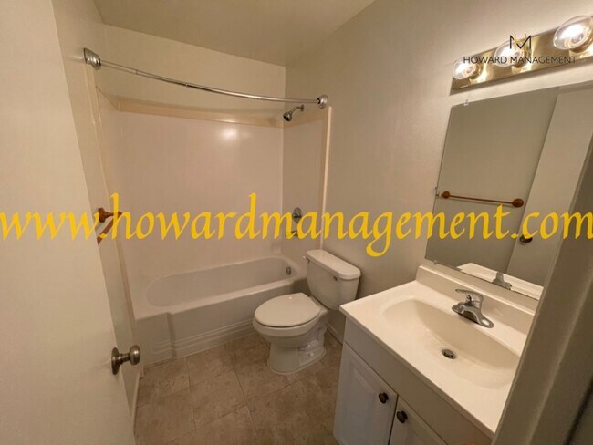 Building Photo - Bonus Den! Beautiful lower condo with large patio in Tara Hills, a resort style living complex!