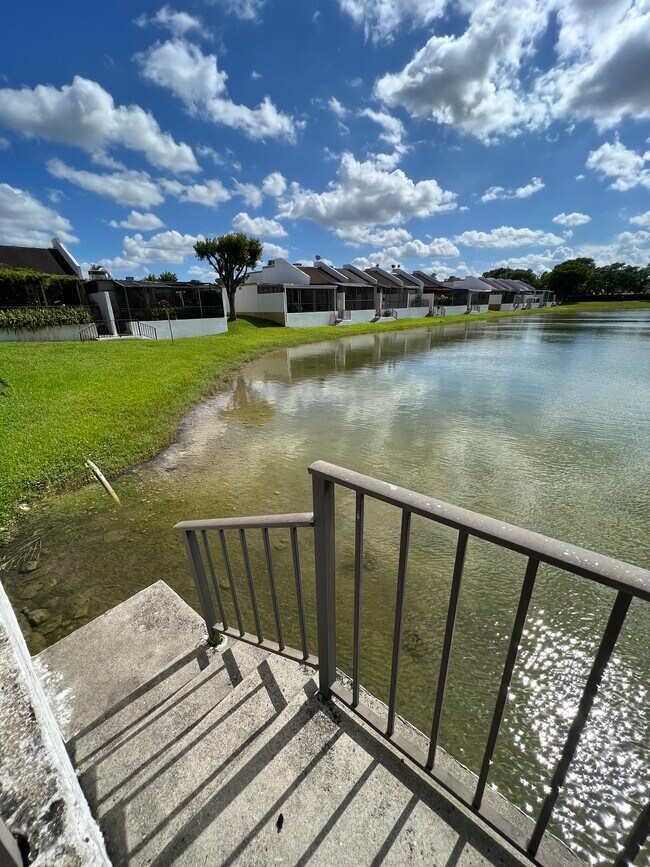 Staircase leading to lake (left side) - 1424 SW 131st Place Cir E