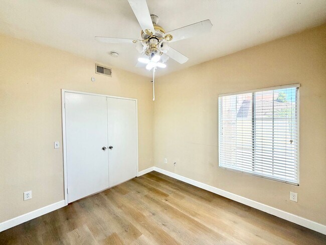Building Photo - Spacious 5 Bedroom Home with 3 Car Garage & Primary Suite Balcony