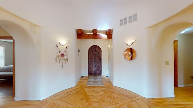 Building Photo - Custom Adobe style home in exclusive Navaj...