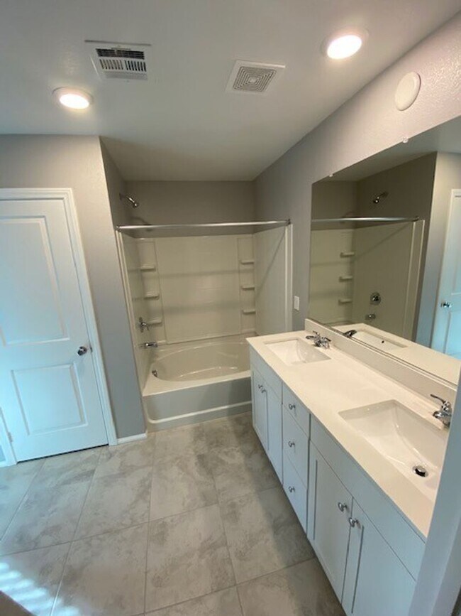 Building Photo - Modern North Las Vegas Townhome with Granite Countertops, Covered Patio & Open-Concept Living