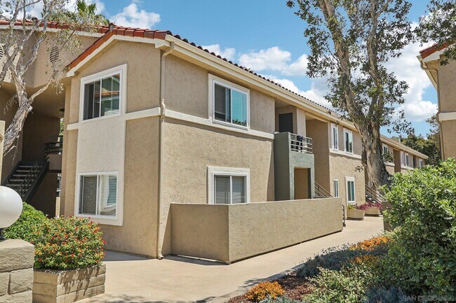 Building Photo - 7565 Charmant Dr