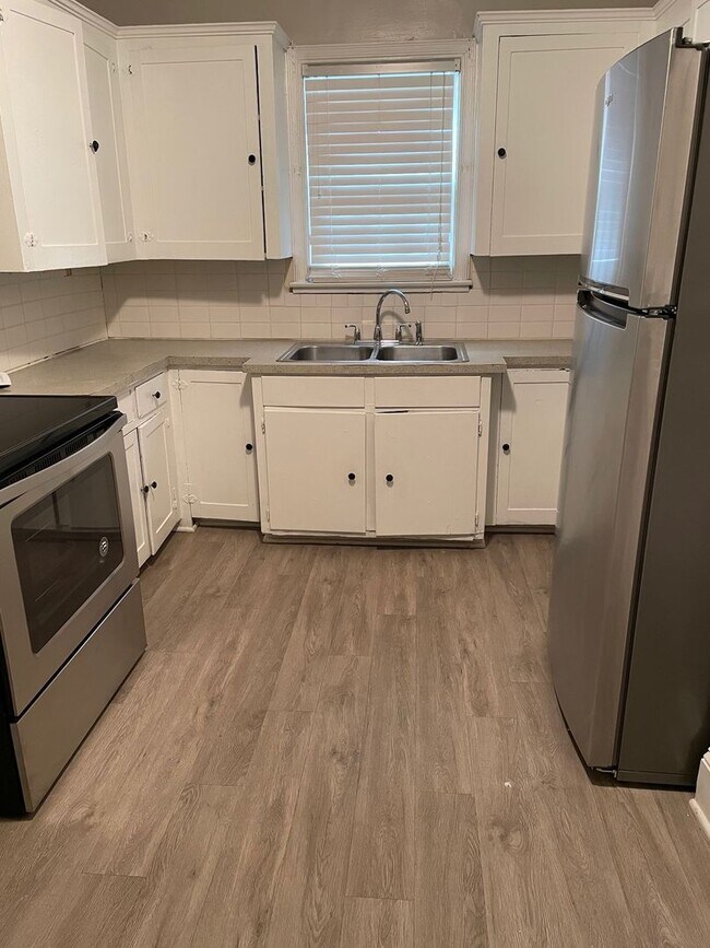 Building Photo - August Special- Renovated Great Two Bedroo...