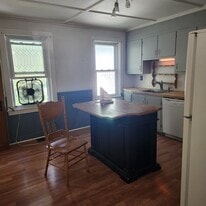 Kitchen with dishwasher and gas range - 34 N B St