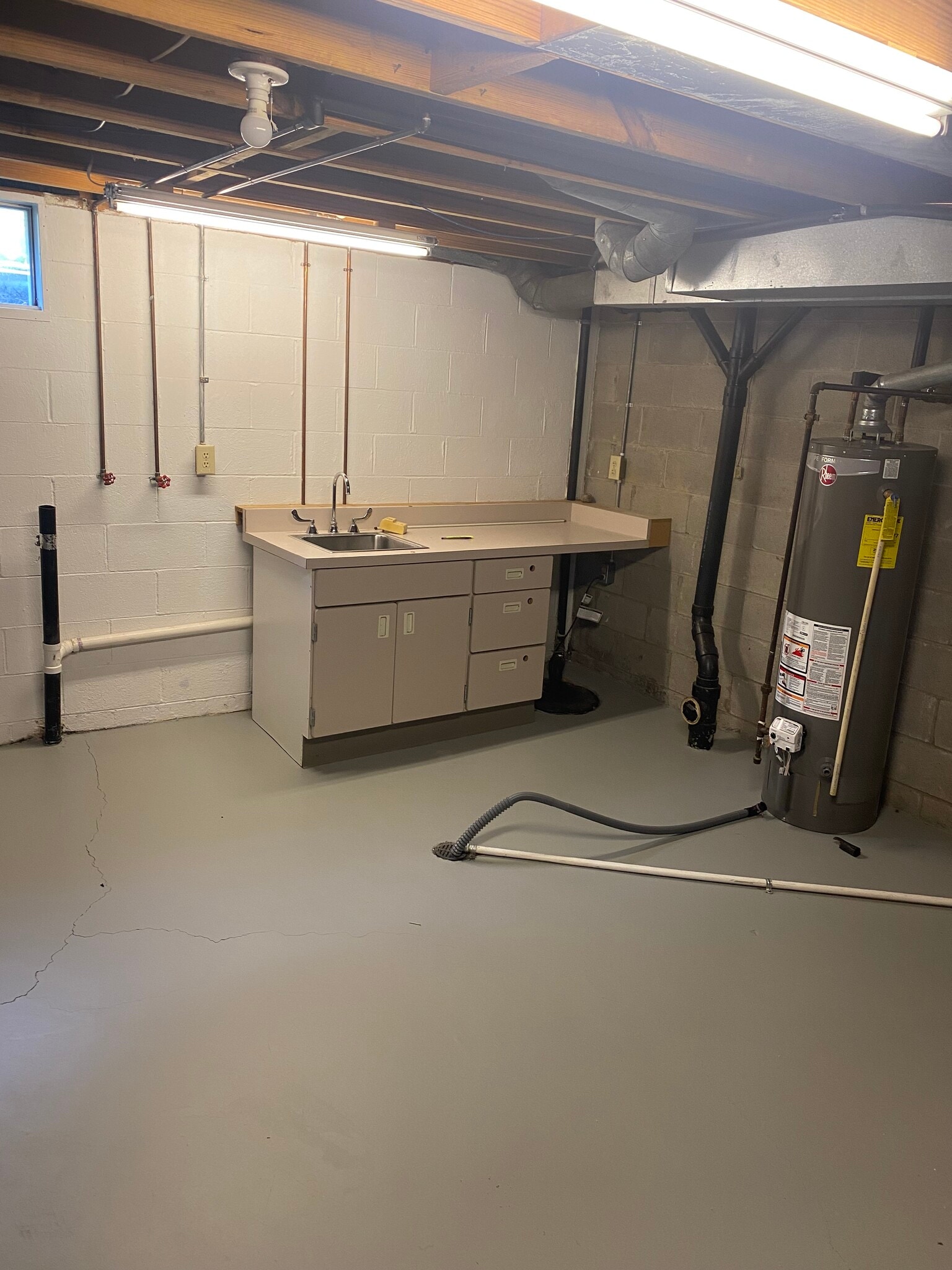laundry area in basement - 5475 Archway Dr