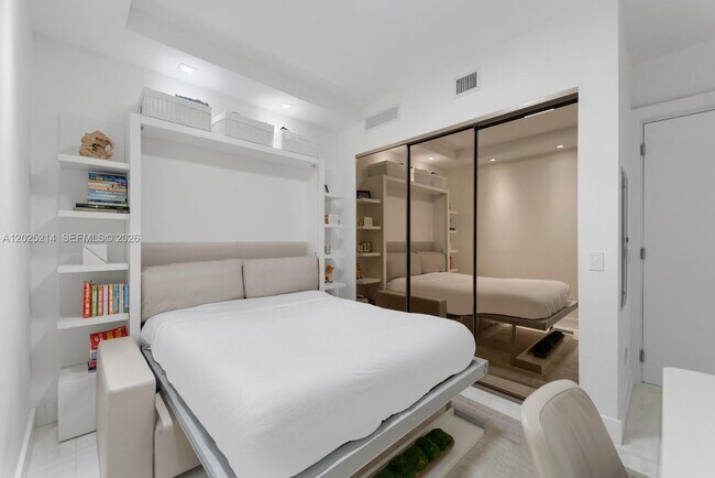 Building Photo - 10203 Collins Ave