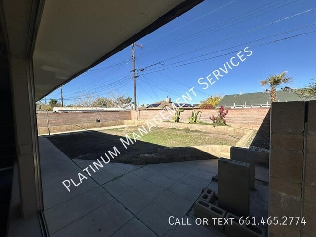 Building Photo - 1839 E Ave Q10