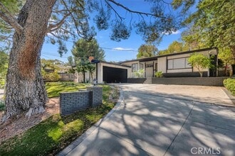 Building Photo - 9425 McLennan Ave.