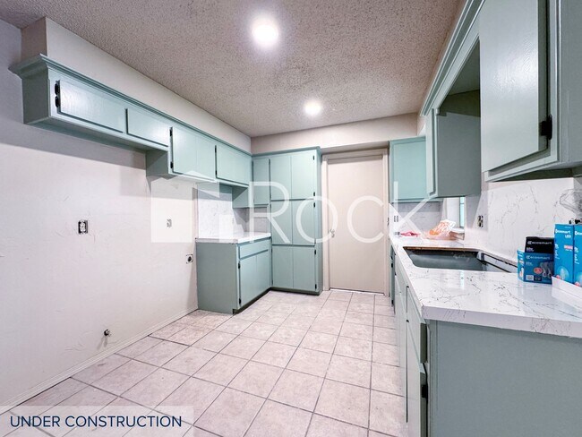 Building Photo - 7024-26 Woodlake Duplex