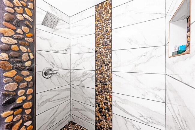 Building Photo - 8888 Collins Ave