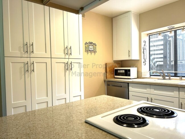 Building Photo - Upgraded 1 bed / 1 bath Condo on the Pala Mesa Golf-Course! With Garage, Water included!