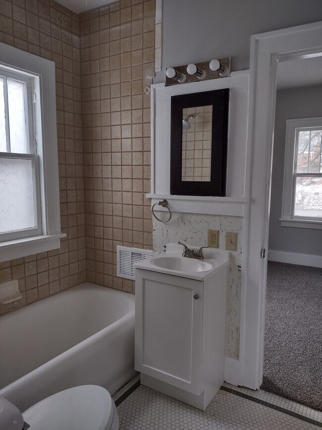 Building Photo - Charming 3-Bedroom Home with Finished Attic, Enclosed Front Porch & Spacious Backyard