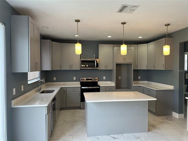 Building Photo - 545 1st Cape Coral Dr